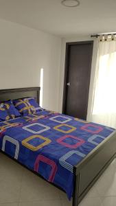 Cama o camas de una habitación en Hermoso Apartamento en Santa Marta