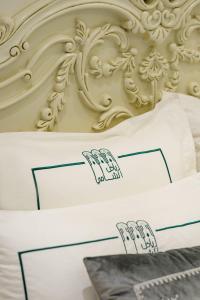 Postel nebo postele na pokoji v ubytování HOTEL RIAD CHAMI