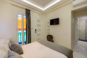 Postel nebo postele na pokoji v ubytování HOTEL RIAD CHAMI