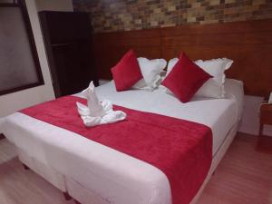 Postel nebo postele na pokoji v ubytování Hotel Casa Lamay