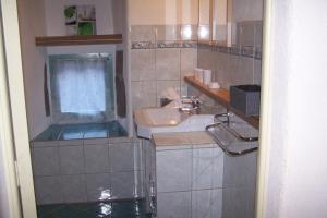 Koupelna v ubytování Salomony Chambre d'Hôtes