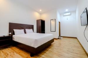 Katil atau katil-katil dalam bilik di Hotel Sumaryo