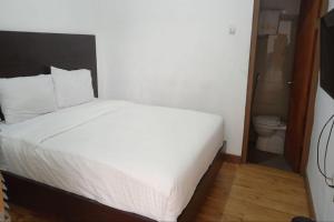 Katil atau katil-katil dalam bilik di Hotel Sumaryo