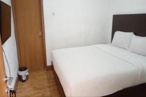 Katil atau katil-katil dalam bilik di Hotel Sumaryo