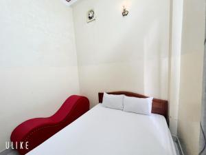 Postel nebo postele na pokoji v ubytování Thanh Tâm Hotel
