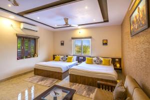 Postel nebo postele na pokoji v ubytování Zostel Homes Pushkar