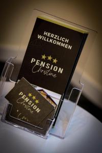 a display with two passports on top of a table at Pension Christine in Großweikersdorf