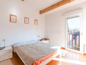 Posteľ alebo postele v izbe v ubytovaní Villa spacieuse à Gruissan, 4 chambres, jardin privé, clim, proche plage, idéal familles/amis - FR-1-409A-18