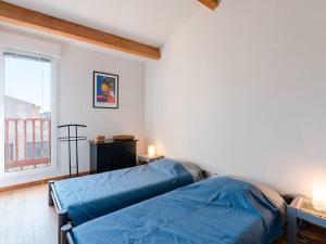 Posteľ alebo postele v izbe v ubytovaní Villa spacieuse à Gruissan, 4 chambres, jardin privé, clim, proche plage, idéal familles/amis - FR-1-409A-18