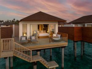 a villa on a pier in the water at Avani Plus Fares Maldives Resort in Baa Atoll +110 photos