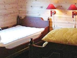 Postel nebo postele na pokoji v ubytování Holiday home skudeneshavn II