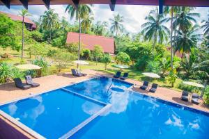 Bazén v ubytování Celestia Ayurveda Resort nebo v jeho okolí