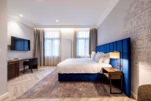 Posteľ alebo postele v izbe v ubytovaní Grandhotel Pupp