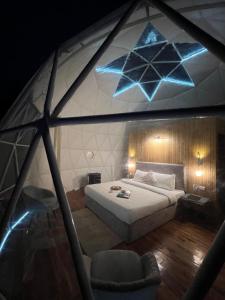 Letto o letti in una camera di GLAMPING CLUB