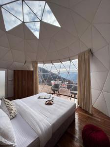 Letto o letti in una camera di GLAMPING CLUB