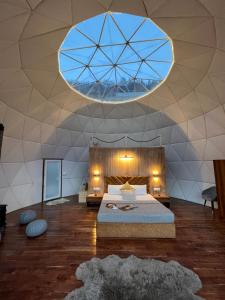 Letto o letti in una camera di GLAMPING CLUB