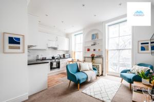 Setusvæði á Charming 1 Bed Apartment near British Museum By City Apartments UK Short Lets Serviced Accommodation