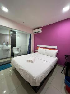 Letto o letti in una camera di Red Orange Hotel Klang - 5 min to Klang Town