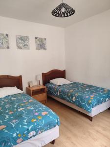 Posteľ alebo postele v izbe v ubytovaní Gîte des remparts réservation par téléphone laissez vos coordonnées