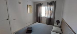 Postel nebo postele na pokoji v ubytování Sand Club Family + 17 fotografií