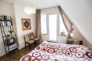 Postel nebo postele na pokoji v ubytování Ferienwohnung Auf dem schönen Felde