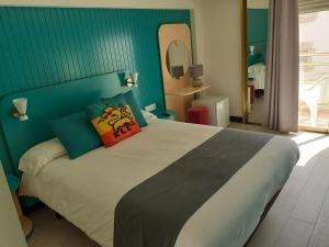 Postel nebo postele na pokoji v ubytování Hotel Clibomar Jamaica