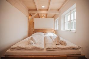 Postel nebo postele na pokoji v ubytování Apartman s výhledem