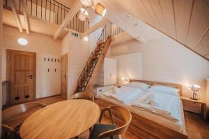 Postel nebo postele na pokoji v ubytování Apartman s výhledem