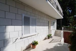 Ein Garten an der Unterkunft Guesthouse Matusic