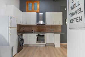 Kuchyňa alebo kuchynka v ubytovaní Centric Gracia Apartments