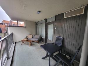 En balkon eller terrasse på Duinstraatje 1