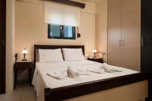 Katil atau katil-katil dalam bilik di Vidakis Villas 2