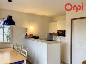 Køkken eller tekøkken på Résidence LE BOCAGE PORT BOURGENAY 85440