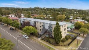 an aerial view of a building on a city street at TC GARDENS 11 in Armidale
