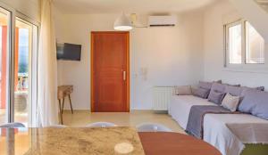 Et tv og/eller underholdning på Elegant Penthouse with Sea View