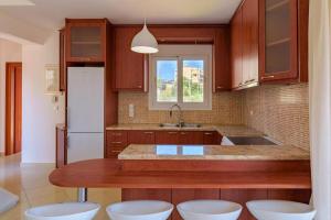 Køkken eller tekøkken på Elegant Penthouse with Sea View