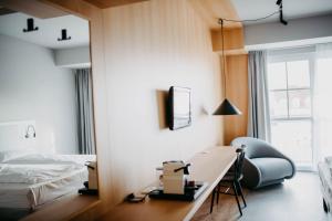 Letto o letti in una camera di ibis Styles Graz Messe
