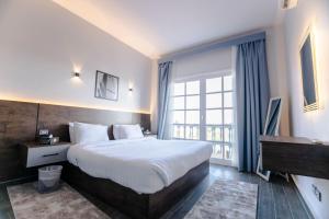 El Gouna Elite Worldwide Sea & Garden Residences - Hurghada, Egypt客房内的一张或多张床位