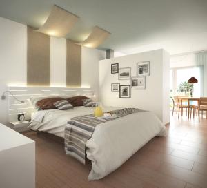Кровать или кровати в номере Apartamentos Castaví