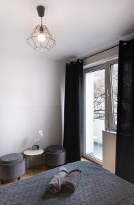Posteľ alebo postele v izbe v ubytovaní ClickTheFlat Constitution Square Apart Rooms