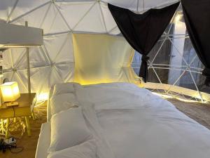 Llit o llits en una habitació de Foreste’ Camp