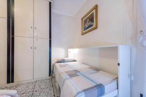 Postel nebo postele na pokoji v ubytování Casa Vacanze Baccolo