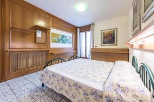 Postel nebo postele na pokoji v ubytování Casa Vacanze Baccolo