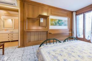 Postel nebo postele na pokoji v ubytování Casa Vacanze Baccolo