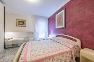 Postel nebo postele na pokoji v ubytování Casa Vacanze Baccolo