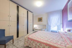 Postel nebo postele na pokoji v ubytování Casa Vacanze Baccolo