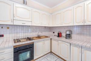 Kuchyň nebo kuchyňský kout v ubytování Casa Vacanze Baccolo