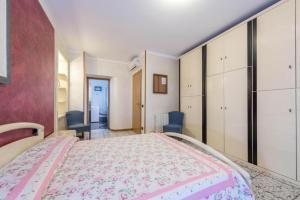 Postel nebo postele na pokoji v ubytování Casa Vacanze Baccolo