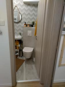 Kúpeľňa v ubytovaní Apartman 7th Heaven