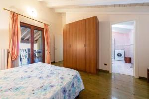 Postel nebo postele na pokoji v ubytování Casa Vacanze Baccolo